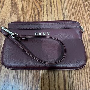 DKNY Maroon wristlet w/ gold accents